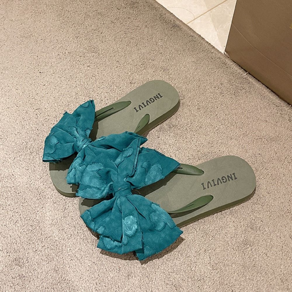 Zachte zool slippers met strik - Anti Loop Rubber recensie en prijs