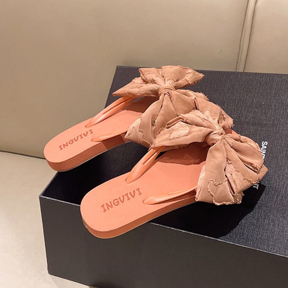 Zachte zool slippers met strik - Anti Loop Rubber recensie en prijs