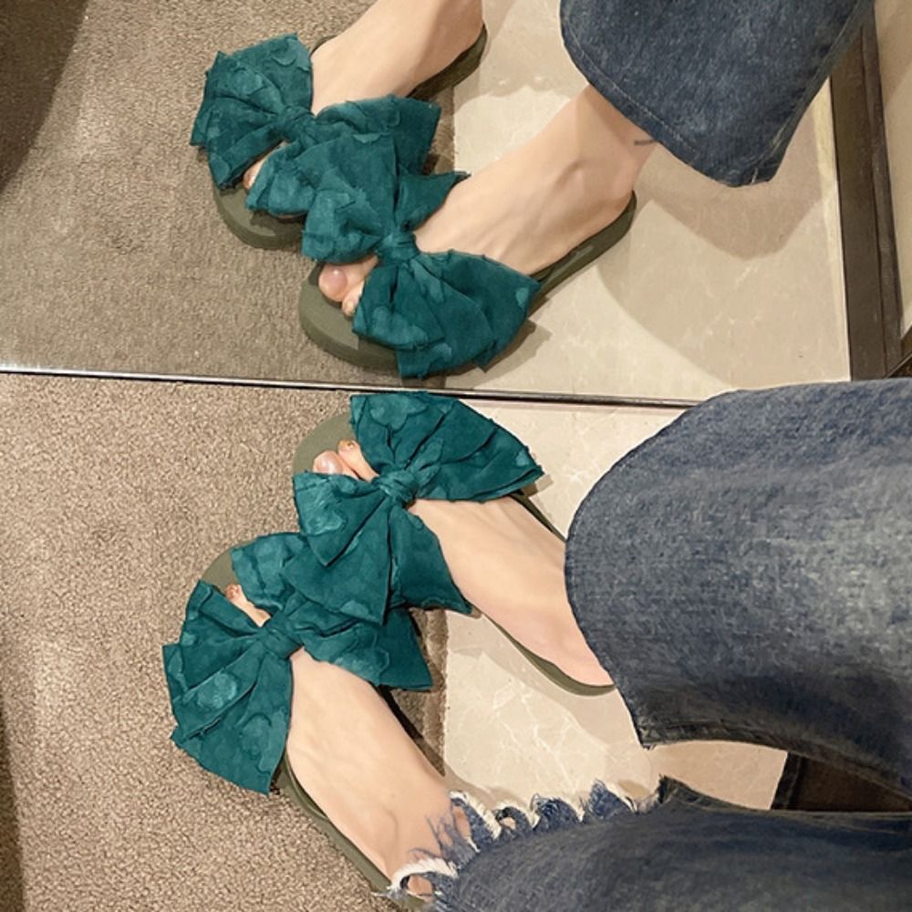 Zachte zool slippers met strik - Anti Loop Rubber recensie en prijs